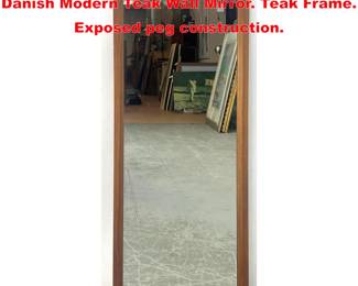 Lot 1256 AKSEL KJERSGAARD ODDER Danish Modern Teak Wall Mirror. Teak Frame. Exposed peg construction.