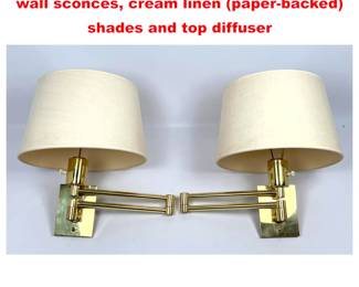 Lot 1205 Pair of Hanson swing arm brass wall sconces, cream linen paperbacked shades and top diffuser