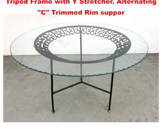 Lot 1656 Arthur Umanoff round dining table. Tripod Frame with Y Stretcher. Alternating C Trimmed Rim suppor