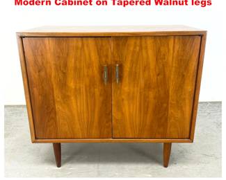 Lot 1362 Walnut two door Mid Century Modern Cabinet on Tapered Walnut legs