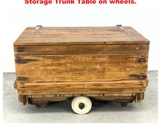 Lot 1432 Restoration Hardware Rustic Pine Storage Trunk Table on wheels. 