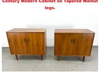 Lot 1353 Pair of Walnut two door Mid Century Modern Cabinet on Tapered Walnut legs. 