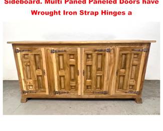 Lot 1575 Rustic Paneled Facade Credenza Sideboard. Multi Paned Paneled Doors have Wrought Iron Strap Hinges a