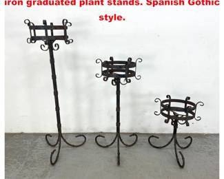 Lot 1668 Set 3 Mid 20th Century wrought iron graduated plant stands. Spanish Gothic style. 
