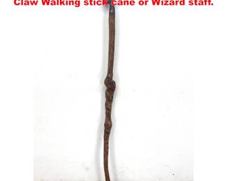 Lot 1448 Metal and wood. Glass ball and Claw Walking stick cane or Wizard staff.