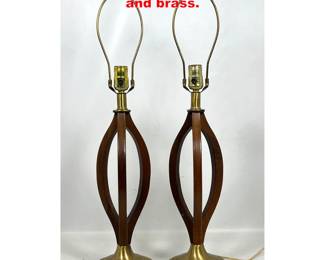 Lot 1386 Pair Modline Lamps. Curving wood and brass.