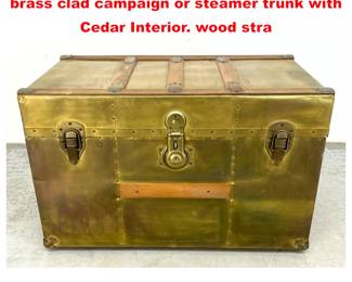 Lot 1633 George C. Brown and Company Inc. brass clad campaign or steamer trunk with Cedar Interior. wood stra