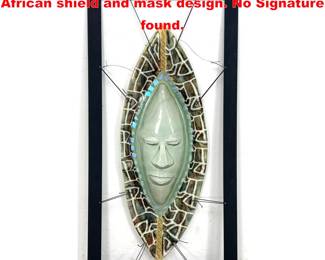 Lot 1380 Artisan Fused Glass Wall sculpture. African shield and mask design. No Signature found. 