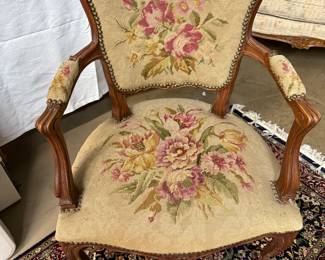 French antique chair covered in needlepoint