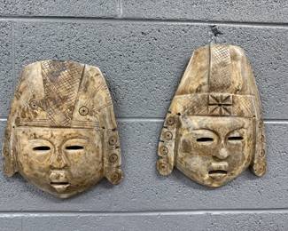 Carved stone masks