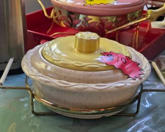 Vintage casserole dishes and carriers.  So pretty!