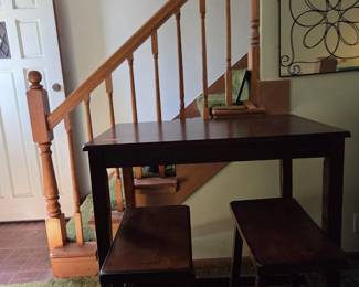 Solid wood, espresso finish table with 2 stools.  Perfect condition.