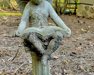 Available for Purchase
Carved Stone Garden Statue
