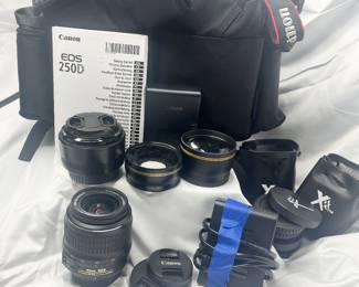 NO CAMERA
Canon Battery Chargers, Bag, Lenses, Caps & Accessories