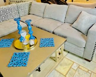Thomasville Sectional Sofa Elegant, Tufted Seats have Extra Padding and are Incredibly Comfortable
Large Smooth Back Cushions with Extra Padding
Wide Track Arm at the Ideal Height
Beautifully Finished in 100% Polyester Fabric with Two Coordinating Pillows
Large Tufted, Lift-top Storage Ottoman