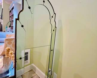 Masterfully Designed gilt-framed arched mirror by Uttermost