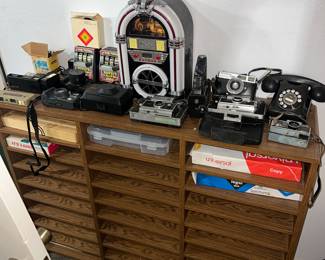 Storage cabinet, Juke Box radio, Vintage Cameras, Vintage telephone, Ect