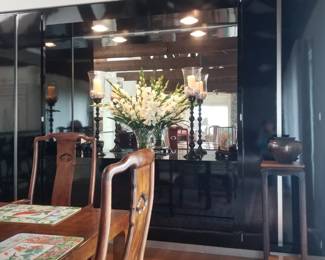 Black lacquer built-in dining room storage with lights & mirror