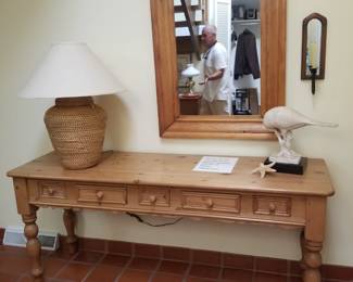 Foyer table; table lamp; mirror