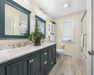 Navy blue double bath vanity & mirrors