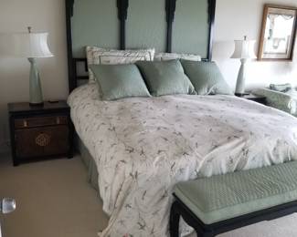 King bed; two nightstands; two table lamps; bench 