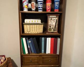 Beautiful bookcase, team cups, school and office supplies.