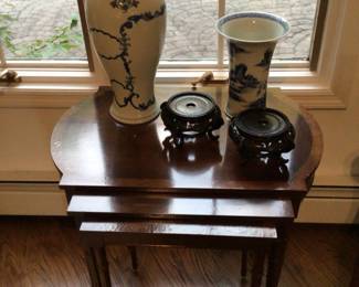 Nesting tables 28”x18”x24” H (top table), Asian pottery