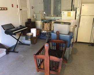 Electric keyboard, wooden rocking baby crib, storage containers, paper waste baskets & fridges