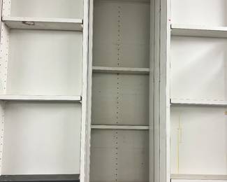 Pantry cabinet. Has 3 rows of sliding shelves