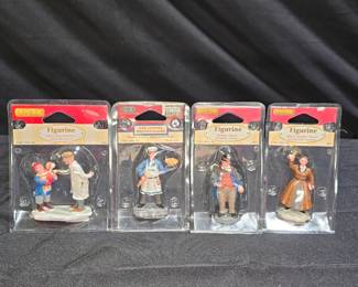 4 Lemax Christmas/Winter Village Figurines