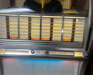 Very Cool late 50's Wurlitzer Console  Jukebox loaded with 45's!