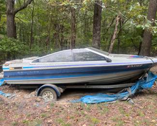 The Boat is a Bayliner.  Not sure of the year. It has a 2.3 Liter Single Over Head Cam Inboard Motor.   The boat needs rehab. The trailer seems to be in good condition. $700 and take it away!