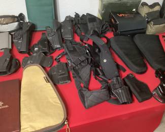 Hand gun holsters