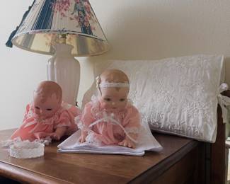 several porcelain dolls