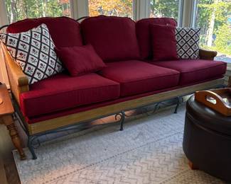  like new condition, Iron and bamboo ox blood red/Asian red textured fabric very comfortable sofa 350 matching loveseat 250