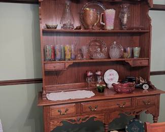 hutch that comes apart the top part can be hung on the wall while the bottom part serves as a sideboard