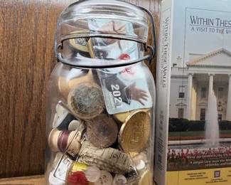jar filled with mixed memorabilia vintage