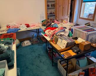 Vintage baby clothes, doll clothes, more CDs, lots of decorative paper for printing and letter writing, towels, bedding, quilts