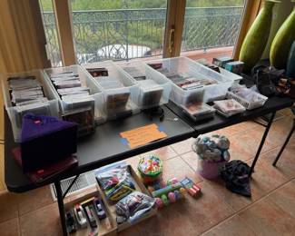 Lots of CD's, secular, pop and Christian music, pens, pencils, Easter items, office supplies
