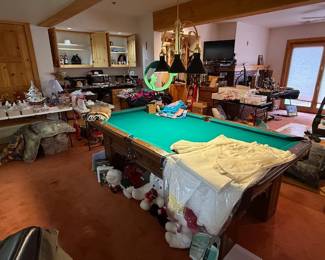 Pool table, with ques, balls, chalk, rack, vintage wedding dress, stuffed animals