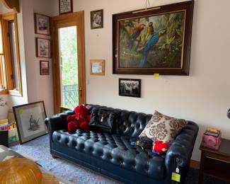 Diamond tuck dark blue leather couch, pictures
