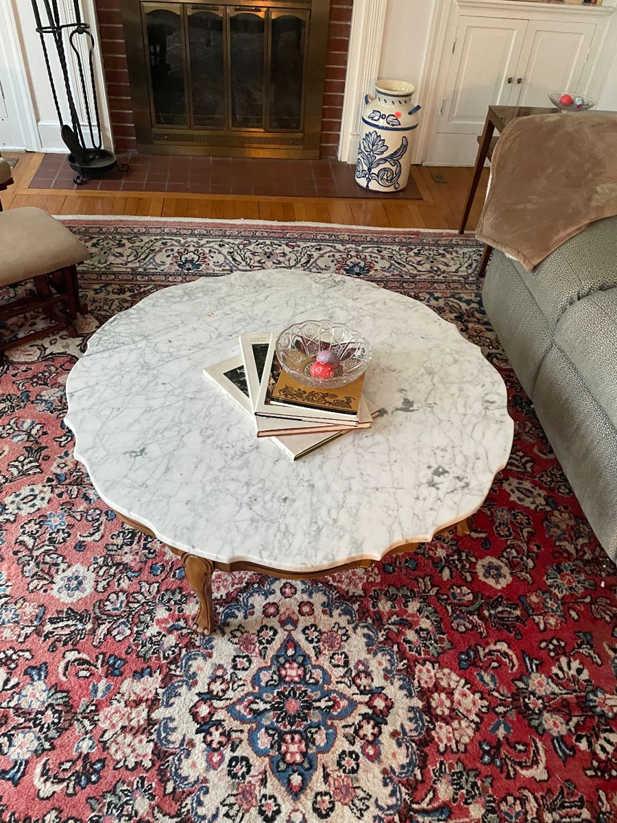 Coffee Table with marble top.