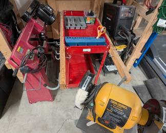 Grinding wheel, tool cart, mig welder, horizontal metal bandsaw.  Grinding wheel sold.