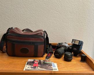 Canon AE-1 Program 35mm SLR Film Camera Bundle – With 2 Lenses, Flash, Case, & Manual