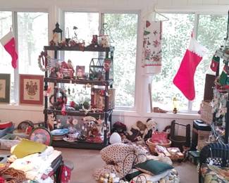 Large sunroom full of Christmas and other items