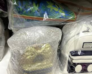 Lot's of new, wrapped, Disney 50th items
