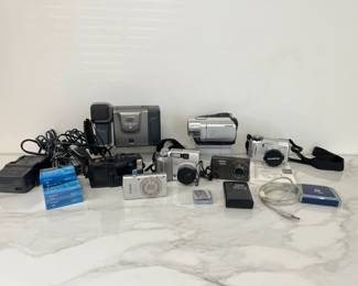 Lot 7976 Vintage CamerasVideo Cameras Olympus Kodak Canon Sony Sharp