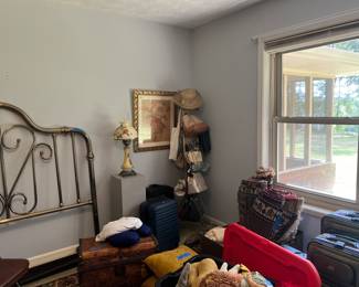 Luggage, queen headboard, purses