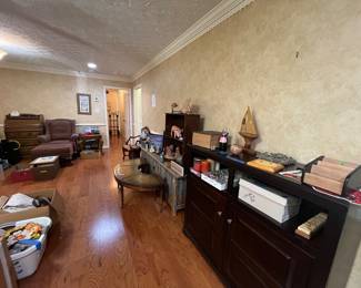Chair and ottoman plus a variety of decorations 