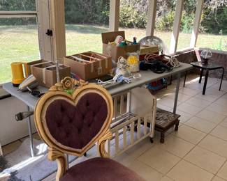 Vintage chair and a variety of tools